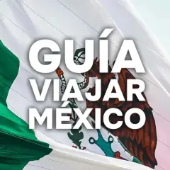 La bandera de México ondea con orgullo. Texto blanco: "GUÍA VIAJAR MÉXICO". ¡Prepárate para tu aventura!