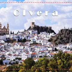 Descubre qué ver en Olvera: un pueblo blanco andaluz coronado por un castillo y una iglesia, con casas apiñadas en la ladera.