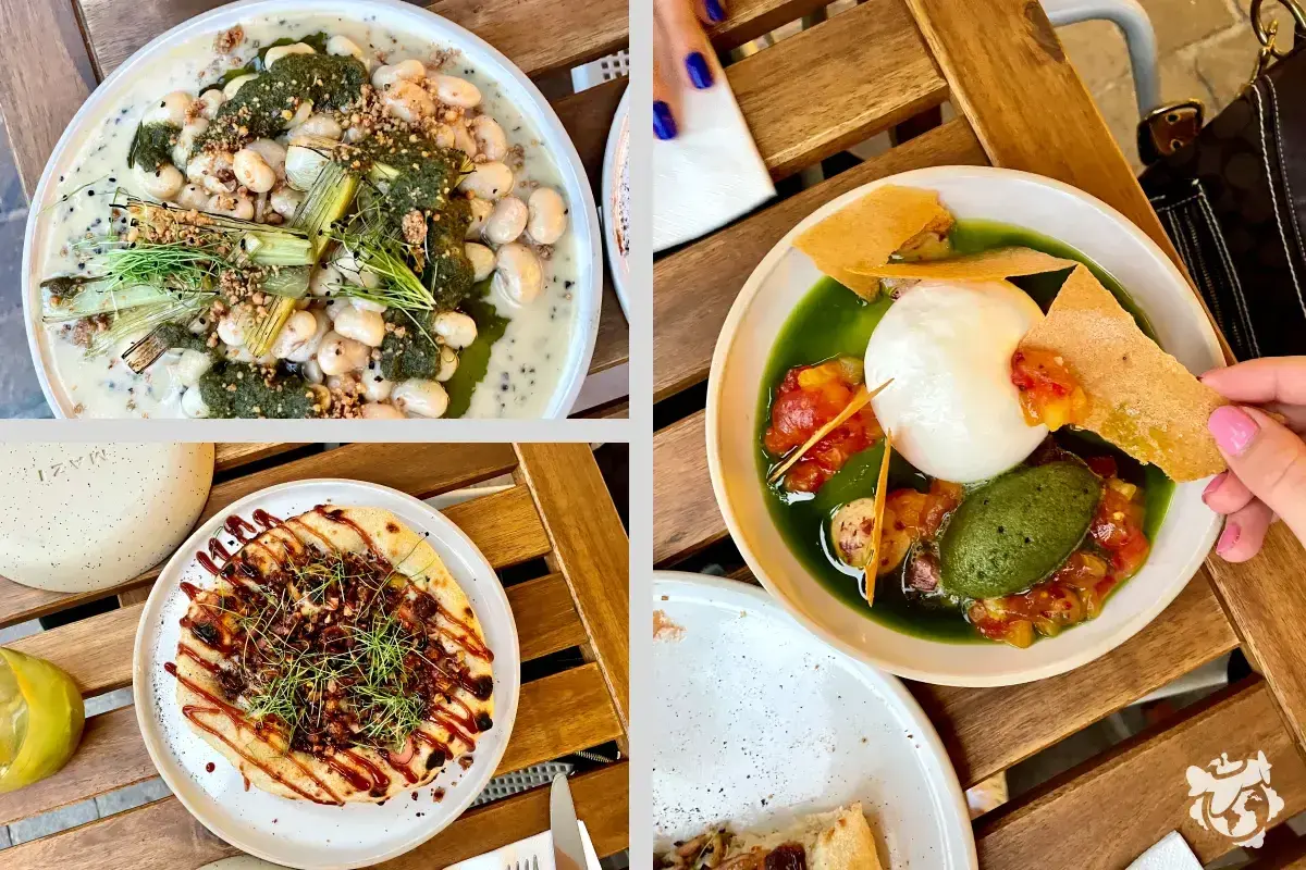 Deliciosos platos para comer en Cracovia: alubias cremosas, pizza y burrata con salsa verde.