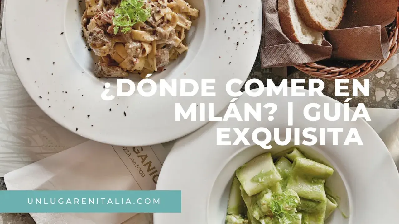 Dos platos de pasta, uno con salsa cremosa y otro con pesto, junto a pan en una cesta. Texto: "¿Dónde comer en Milán? | Guía exquisita".